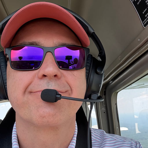 Sam LeHardy at the controls of a light aircraft.